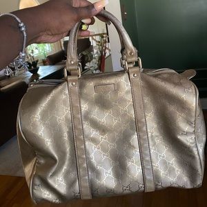 The Gucci Gold GG Imprime Coated Canvas bag